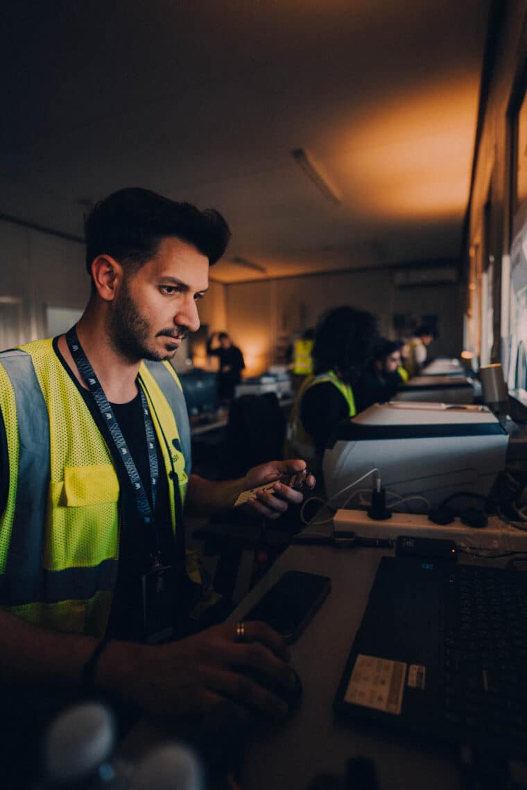 Event Verse team member working accreditation on site